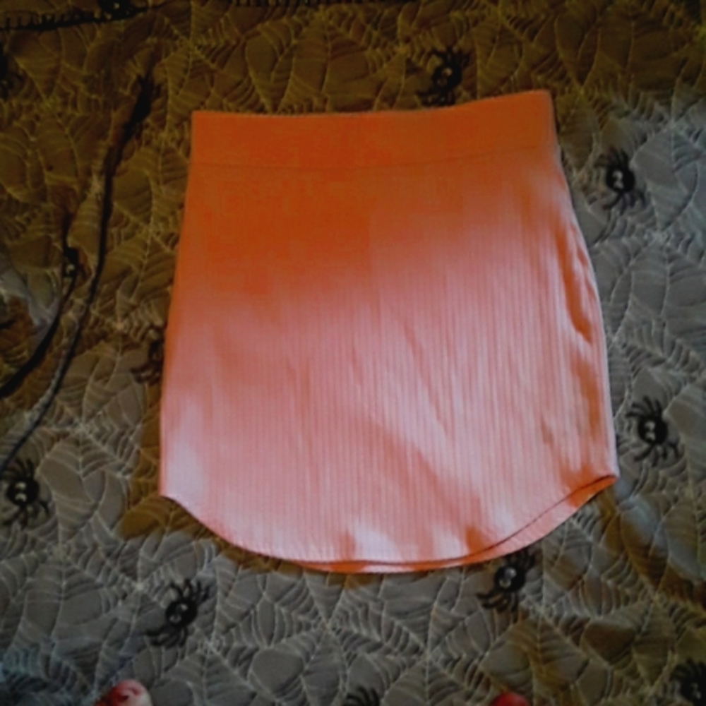 Tight mini curvy skirt